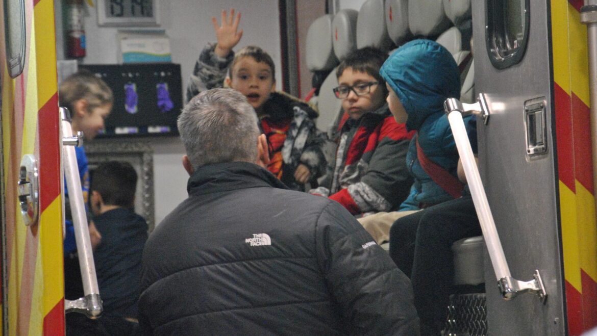 Lonsdale Cub Scouts tour fire station with captain